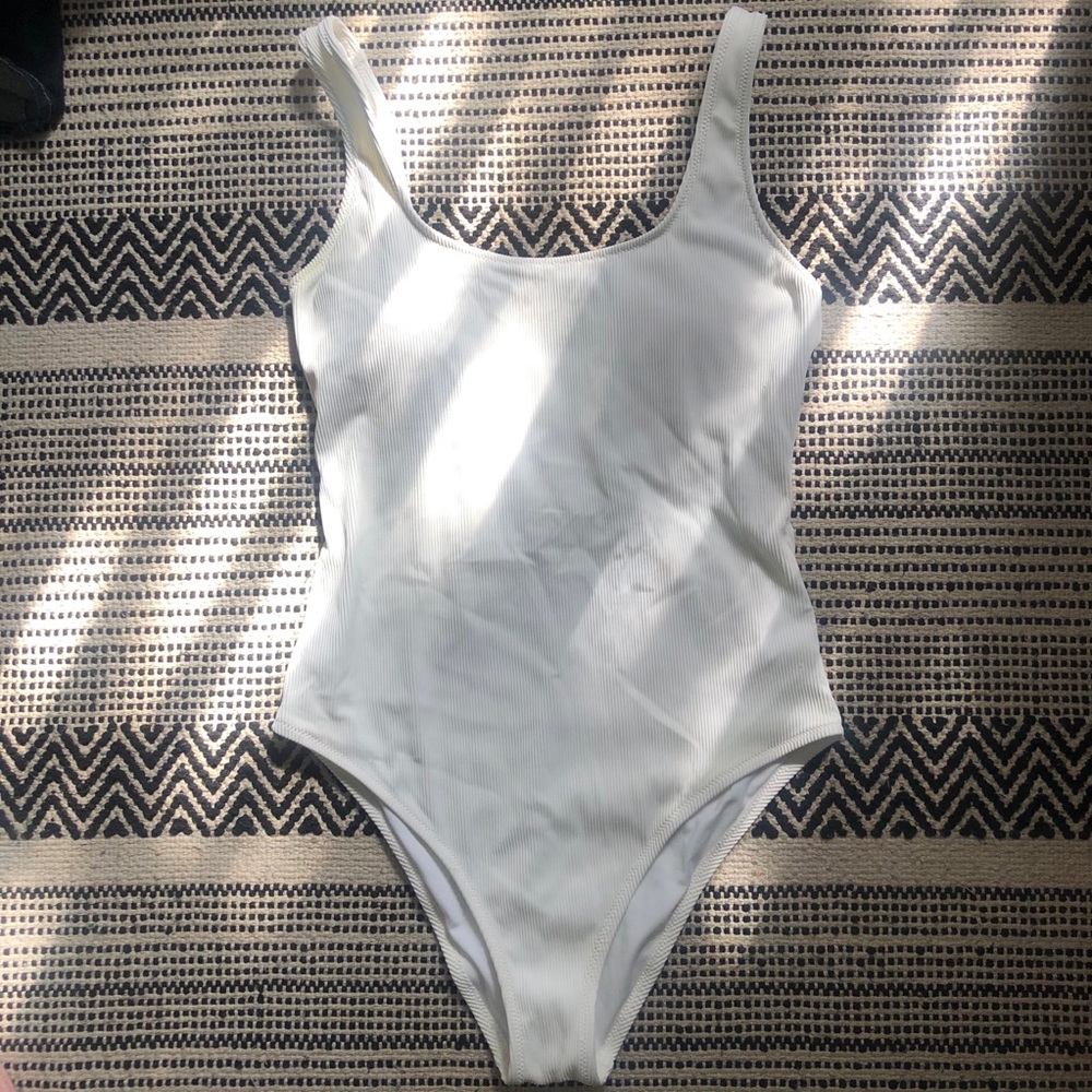 One piece white bathing suit